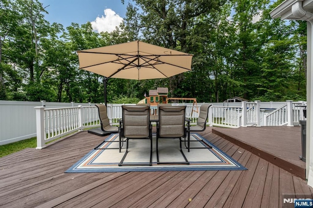 20 Card St, Hamburg, NJ 07419 - wooden deck featuring outdoor dining space and view of wooded area