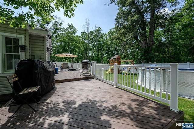 20 Card St, Hamburg, NJ 07419 - deck featuring outdoor dining area, area for grilling, and a playground