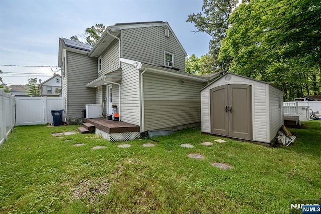 20 Card St, Hamburg, NJ 07419 - back of property featuring a wooden deck and a storage unit