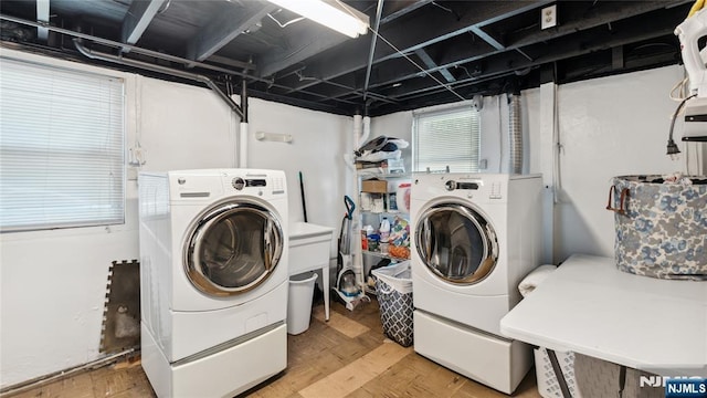 80 Union Ave, Little Ferry, NJ 07643 - laundry area with washing machine and clothes dryer and light wood-style flooring