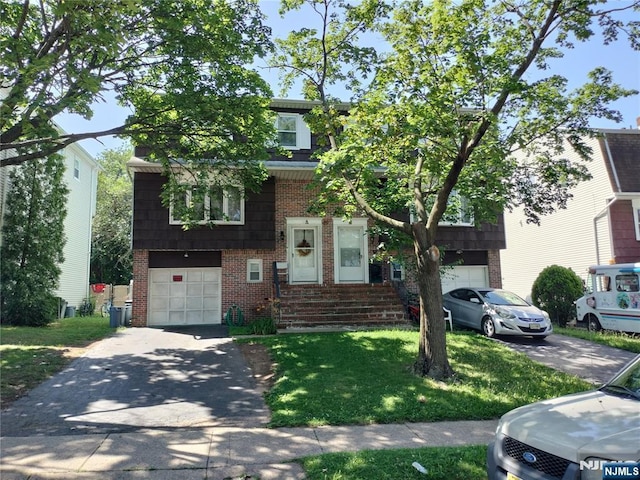 30 Garden Dr, Elmwood Park, NJ 07407 - view of front of home with brick siding, driveway, a garage, and a front lawn