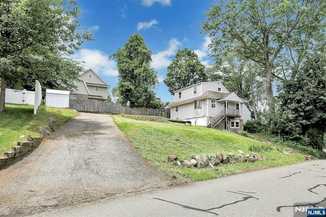 14 N Railroad Ave, Mahwah, NJ 07430 - view of front facade featuring driveway and stairway