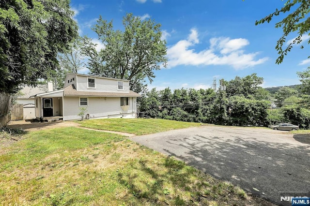 14 N Railroad Ave, Mahwah, NJ 07430 - view of grassy yard with asphalt driveway