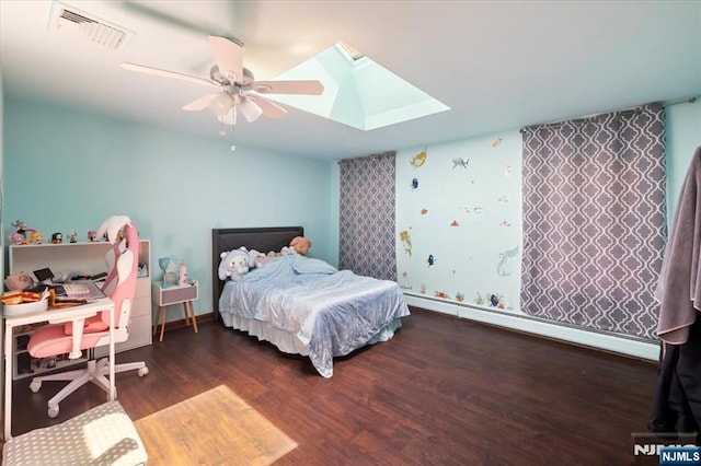 699 Shore Rd, West Milford, NJ 07421 - bedroom with a baseboard heating unit, a skylight, wood finished floors, a desk, and a ceiling fan