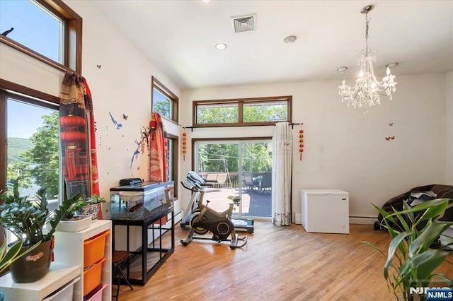 699 Shore Rd, West Milford, NJ 07421 - misc room with healthy amount of natural light, a chandelier, light wood finished floors, and recessed lighting