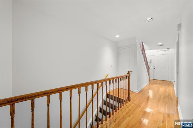 300 Gorge Rd Unit 1, Cliffside Park, NJ 07010 - hallway featuring an upstairs landing, light wood-style flooring, and recessed lighting