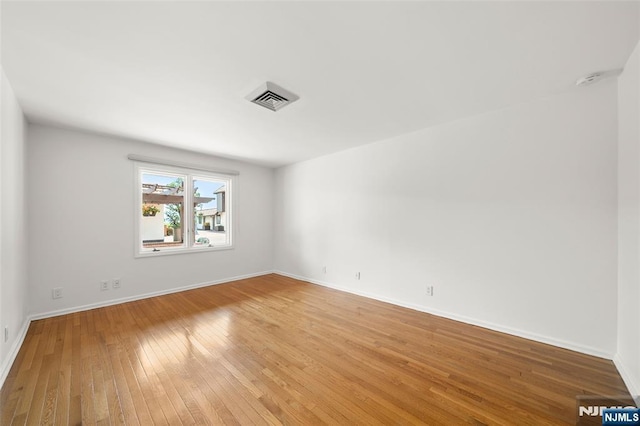 300 Gorge Rd Unit 1, Cliffside Park, NJ 07010 - spare room with light wood-style floors and baseboards
