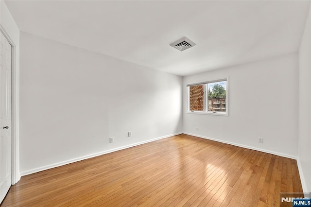 300 Gorge Rd Unit 1, Cliffside Park, NJ 07010 - spare room featuring wood-type flooring and baseboards