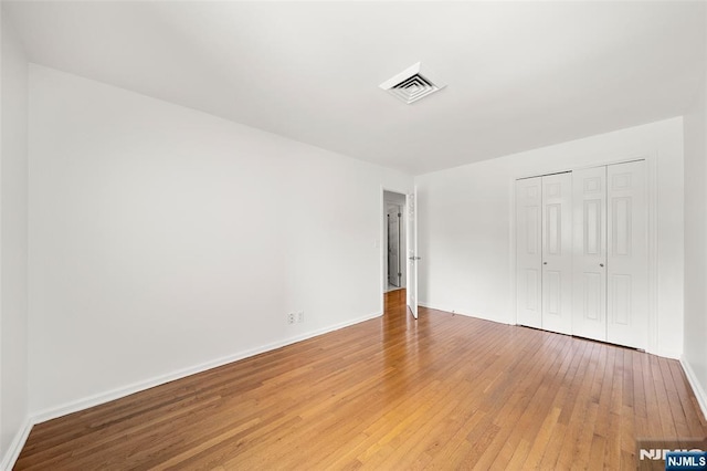 300 Gorge Rd Unit 1, Cliffside Park, NJ 07010 - unfurnished bedroom featuring light wood-style flooring and a closet