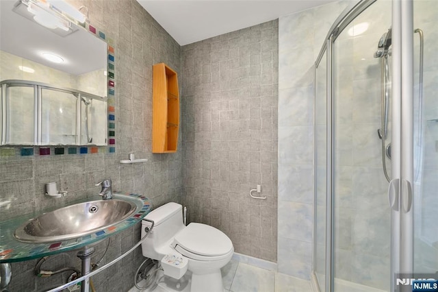 300 Gorge Rd Unit 1, Cliffside Park, NJ 07010 - full bath featuring tile walls, a stall shower, and tile patterned floors