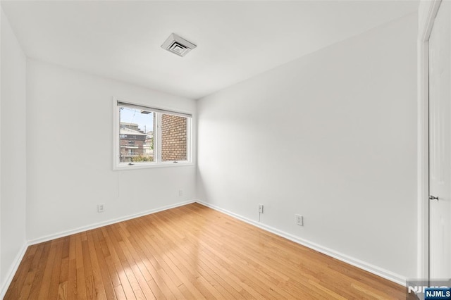 300 Gorge Rd Unit 1, Cliffside Park, NJ 07010 - spare room with light wood-style flooring and baseboards