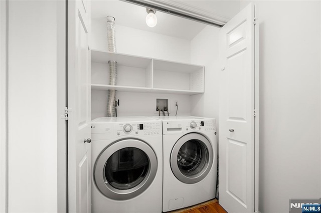 300 Gorge Rd Unit 1, Cliffside Park, NJ 07010 - laundry area with washing machine and clothes dryer and wood finished floors