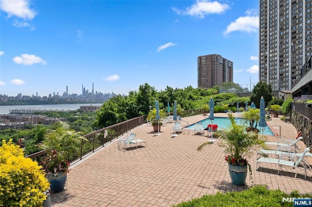 300 Gorge Rd Unit 1, Cliffside Park, NJ 07010 - community pool featuring a view of skyline and a patio