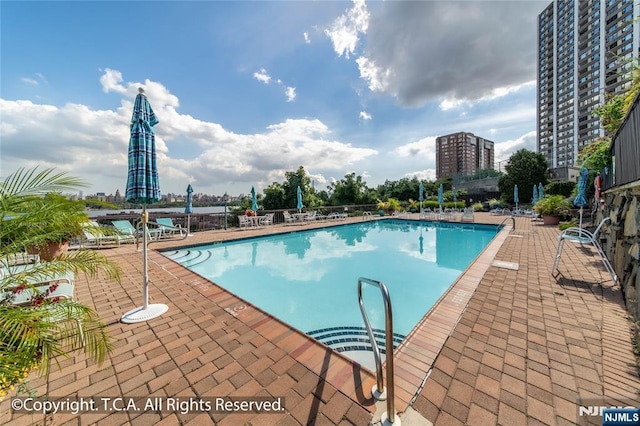 300 Gorge Rd Unit 1, Cliffside Park, NJ 07010 - community pool with a patio