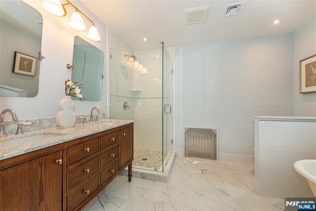 146 Raab Ave, Bloomfield, NJ 07003 - full bath with a shower stall, double vanity, a freestanding tub, marble finish floors, and recessed lighting