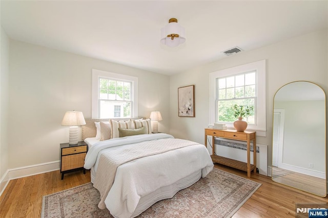 146 Raab Ave, Bloomfield, NJ 07003 - bedroom featuring radiator and wood finished floors