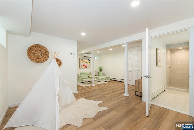 146 Raab Ave, Bloomfield, NJ 07003 - stairs with recessed lighting, wood finished floors, and baseboard heating