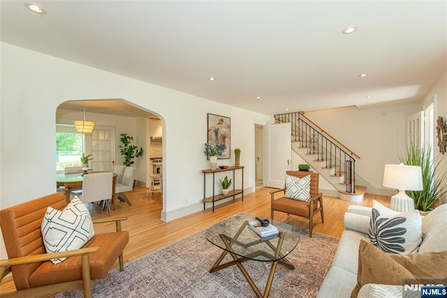 146 Raab Ave, Bloomfield, NJ 07003 - living area featuring arched walkways, light wood-type flooring, recessed lighting, and stairway
