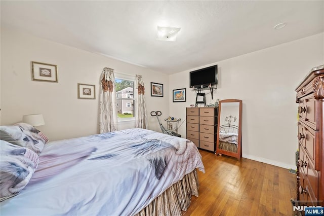 67 6th Ave, Passaic, NJ 07055 - bedroom with hardwood / wood-style floors and baseboards