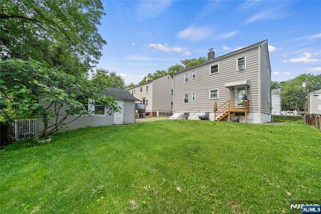 67 6th Ave, Passaic, NJ 07055 - back of house with a chimney