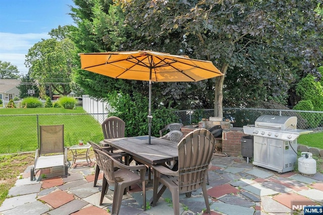 116 Springfield Ave, Hasbrouck Heights, NJ 07604 - fenced backyard with area for grilling, outdoor dining space, and a patio