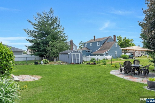 116 Springfield Ave, Hasbrouck Heights, NJ 07604 - fenced backyard with a shed and a patio area