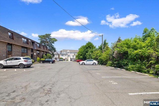 412-432 Broadway Unit 25A, Passaic, NJ 07055 - uncovered parking lot with a residential view