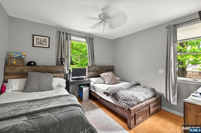 915 Glen Ave, Twp Of Washington, NJ 07676 - bedroom featuring light wood-style flooring and a ceiling fan
