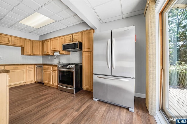 434 3rd Ave, Lyndhurst, NJ 07071 - kitchen featuring stainless steel appliances, dark wood-style floors, and a drop ceiling