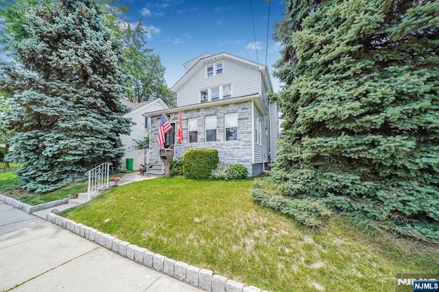 434 3rd Ave, Lyndhurst, NJ 07071 - dutch colonial featuring a front yard