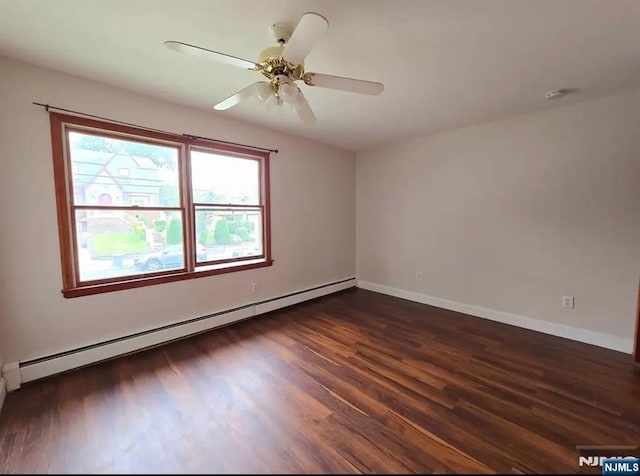 137 Prospect St, Lodi, NJ 07644 - unfurnished room featuring a baseboard radiator, dark wood finished floors, and a ceiling fan