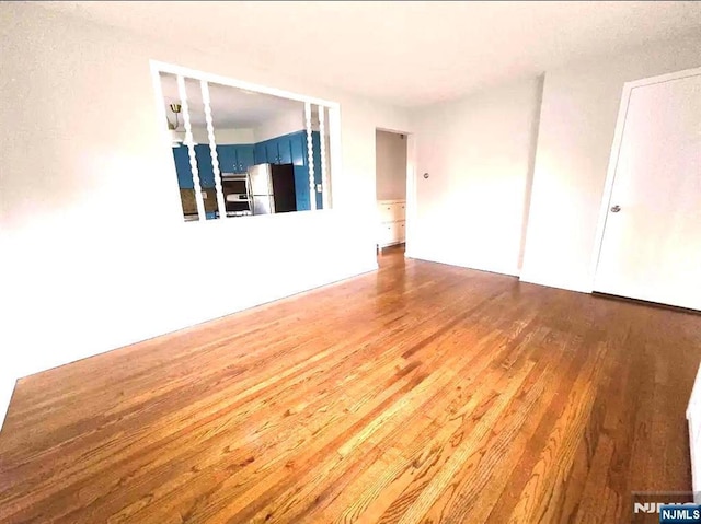 137 Prospect St, Lodi, NJ 07644 - spare room with wood finished floors