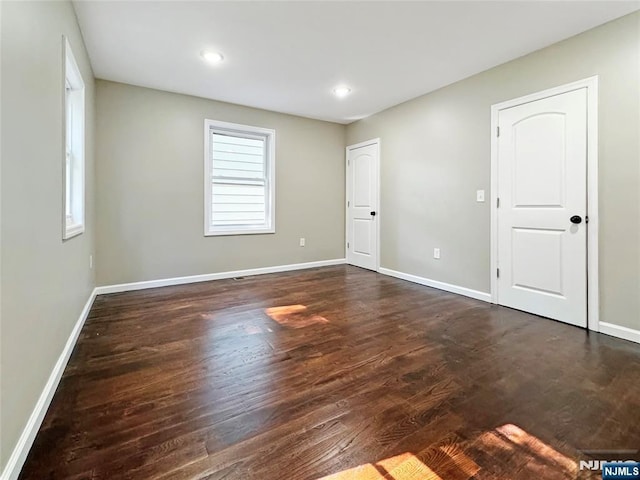 132 Lincoln Ave, Orange, NJ 07050 - unfurnished room with dark wood-style floors and recessed lighting