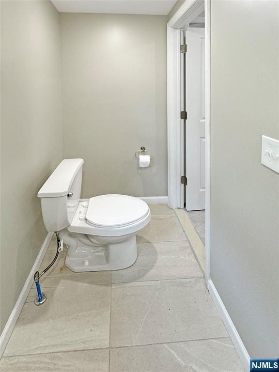 132 Lincoln Ave, Orange, NJ 07050 - bathroom featuring toilet and baseboards