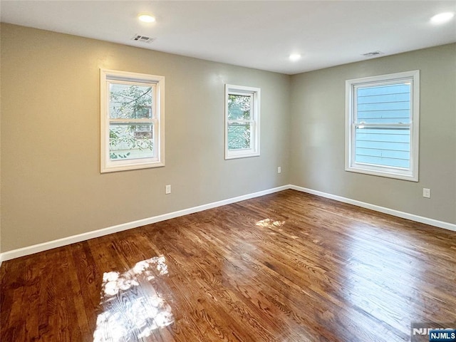 132 Lincoln Ave, Orange, NJ 07050 - spare room with wood finished floors and recessed lighting