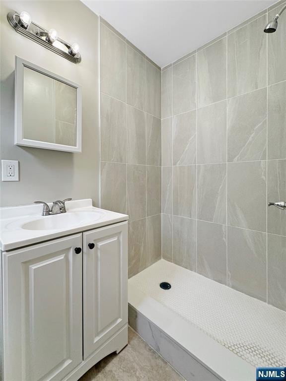 132 Lincoln Ave, Orange, NJ 07050 - bathroom with a tile shower and vanity