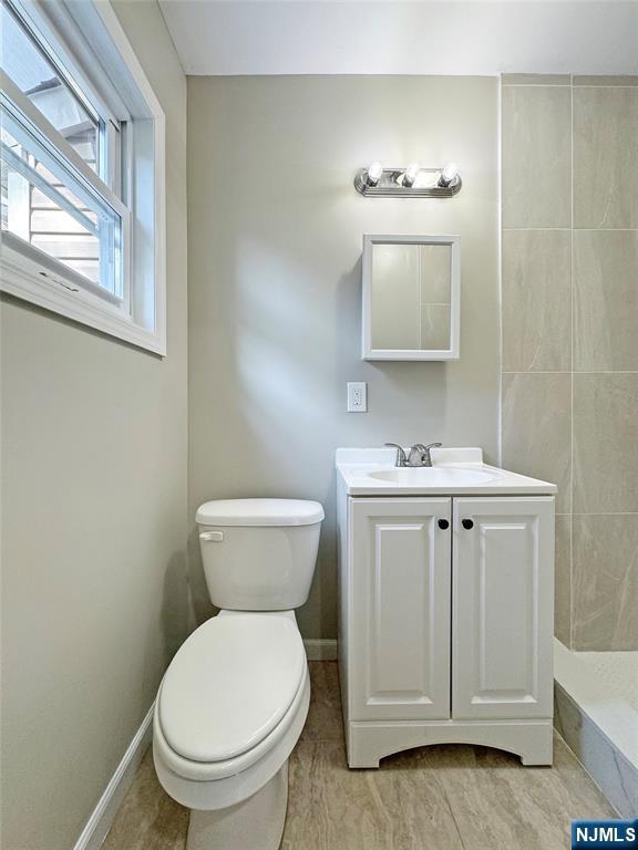 132 Lincoln Ave, Orange, NJ 07050 - bathroom with toilet and vanity