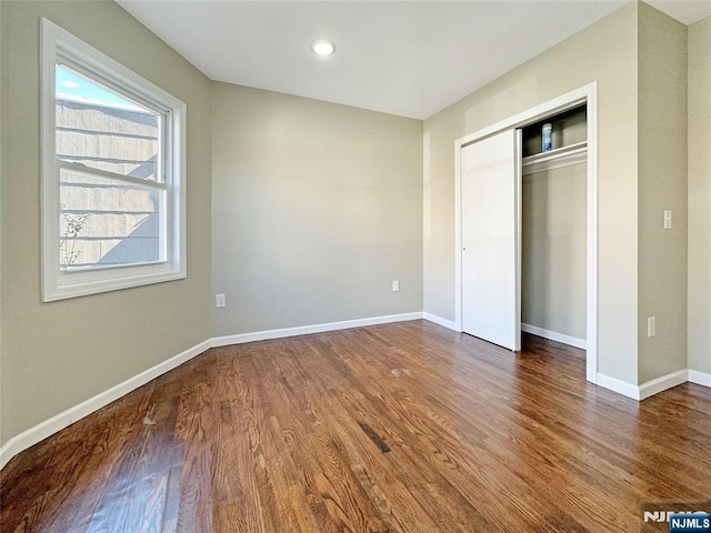 132 Lincoln Ave, Orange, NJ 07050 - unfurnished bedroom with wood finished floors, a closet, and recessed lighting