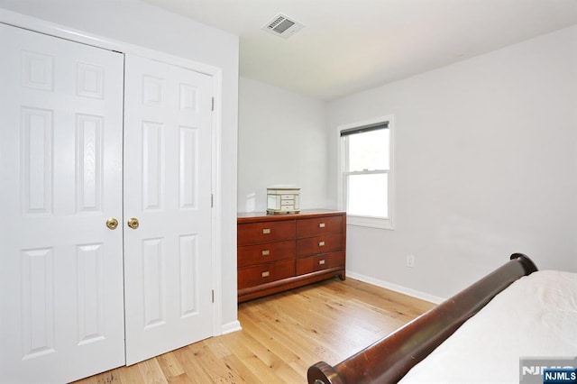8 Cedar Rd, Dumont, NJ 07628 - bedroom with light wood-type flooring and a closet