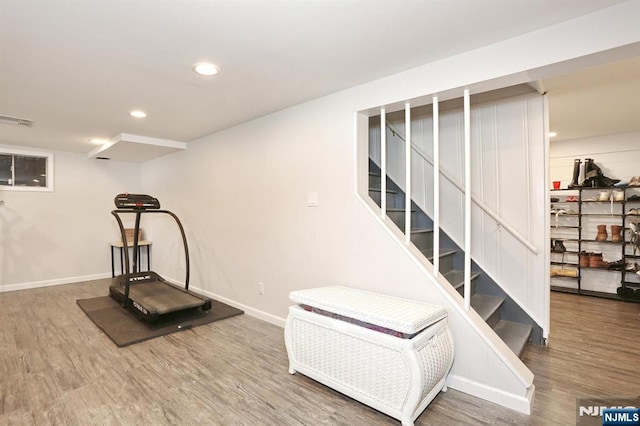 8 Cedar Rd, Dumont, NJ 07628 - exercise room featuring wood finished floors and recessed lighting