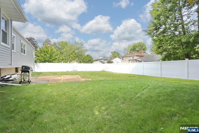 8 Cedar Rd, Dumont, NJ 07628 - fenced backyard with a patio