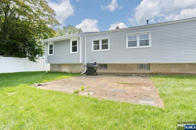 8 Cedar Rd, Dumont, NJ 07628 - rear view of house with a patio area