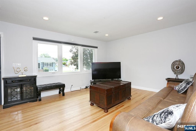 8 Cedar Rd, Dumont, NJ 07628 - living area featuring light wood-style floors and recessed lighting