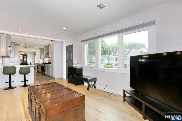 8 Cedar Rd, Dumont, NJ 07628 - living room featuring light wood-style floors and recessed lighting