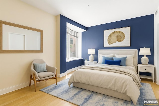 600 Harbor Blvd Unit 973/975, Weehawken, NJ 07086 - bedroom featuring wood finished floors
