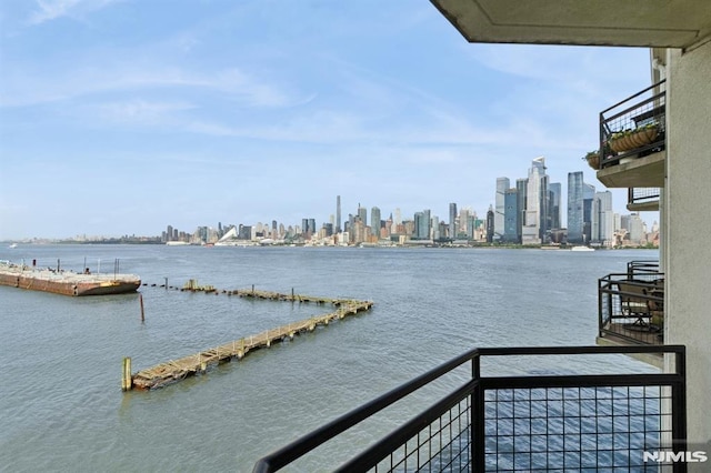 600 Harbor Blvd Unit 973/975, Weehawken, NJ 07086 - dock with a view of skyline, a water view, and a balcony