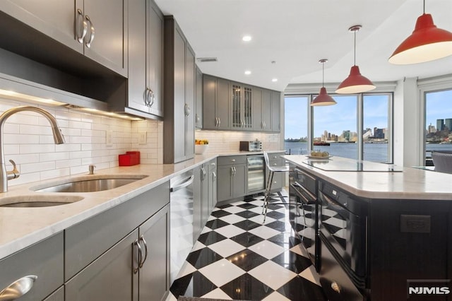 600 Harbor Blvd Unit 973/975, Weehawken, NJ 07086 - kitchen featuring gray cabinetry, tile patterned floors, dishwasher, electric cooktop, and wine cooler