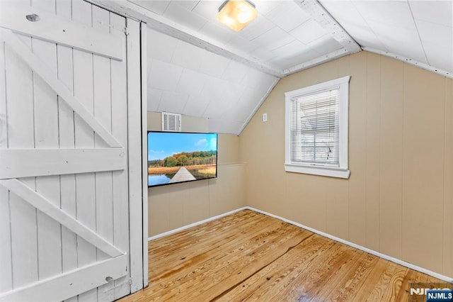 837 Keep St, Linden, NJ 07036 - additional living space featuring wood-type flooring, plenty of natural light, and lofted ceiling