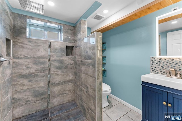 837 Keep St, Linden, NJ 07036 - bathroom featuring vanity, walk in shower, tile patterned floors, and backsplash