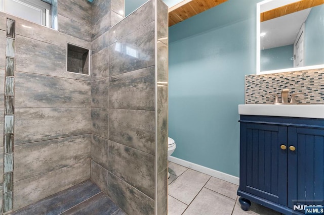 837 Keep St, Linden, NJ 07036 - full bath featuring tile patterned flooring, vanity, decorative backsplash, and a tile shower